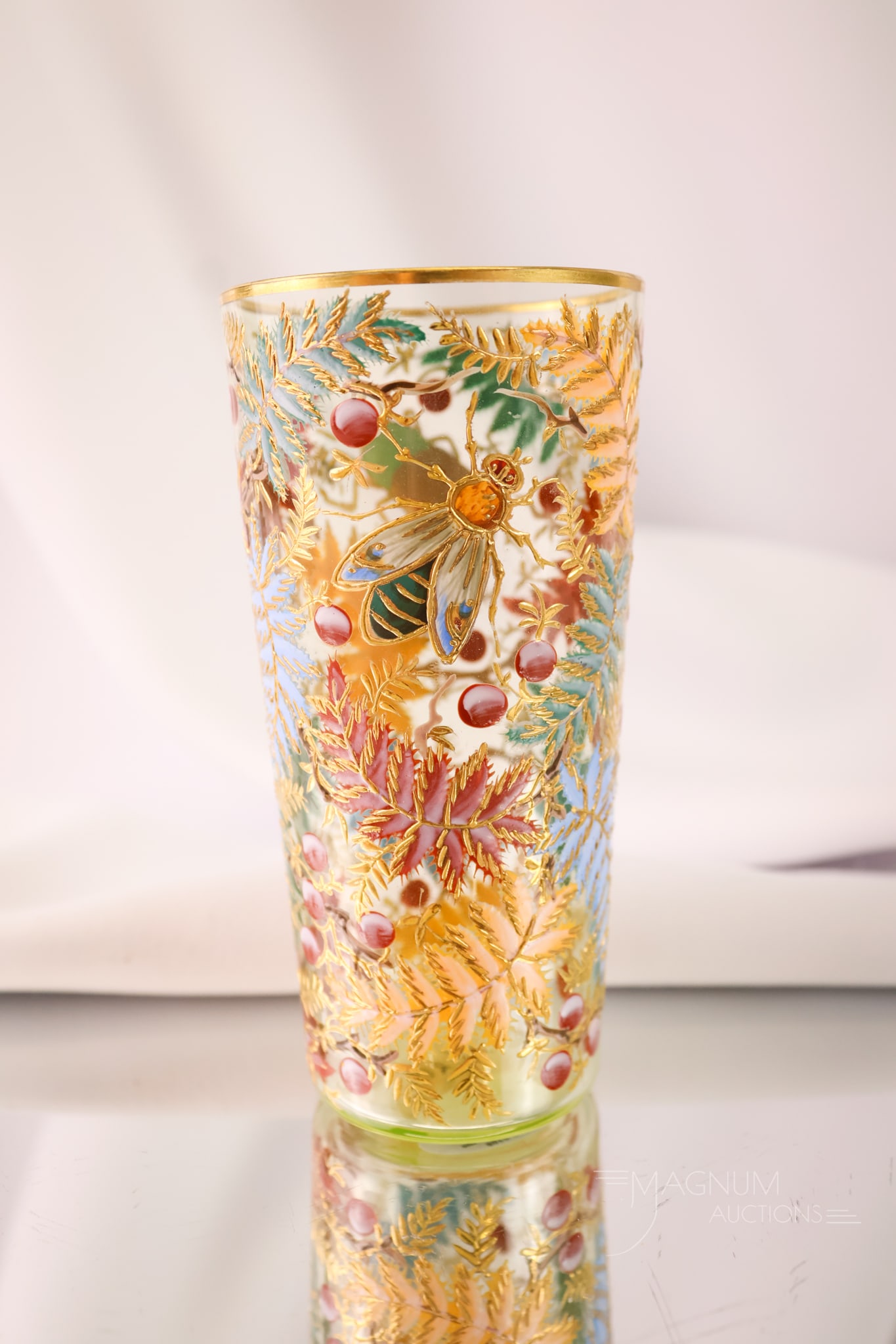 Moser Vaseline Victorian Enamel Gilt Decorated Insects Art Glass Tumbler: A rare find in a piece of antique Moser glass. This is a tumbler in vaseline uranium-rich glass. It glows brightly under black light. The tumbler is lavishly decorated with enamel and gilt decoration 
