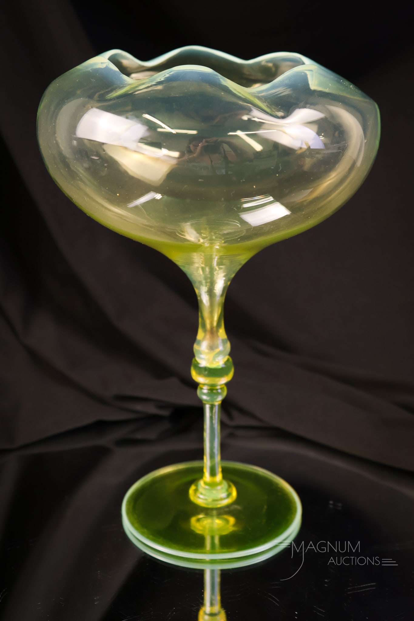 Rare Walsh Vaseline Opalescent Uranium Pedestal Rose Bowl: A very rare find in Walsh Victorian vaseline uranium opalescent glass. This piece was blown and is paper-thin. The pedestal rose bowl sits atop a pedestal stem. It measures 9 1/4" tall and 6" wide.