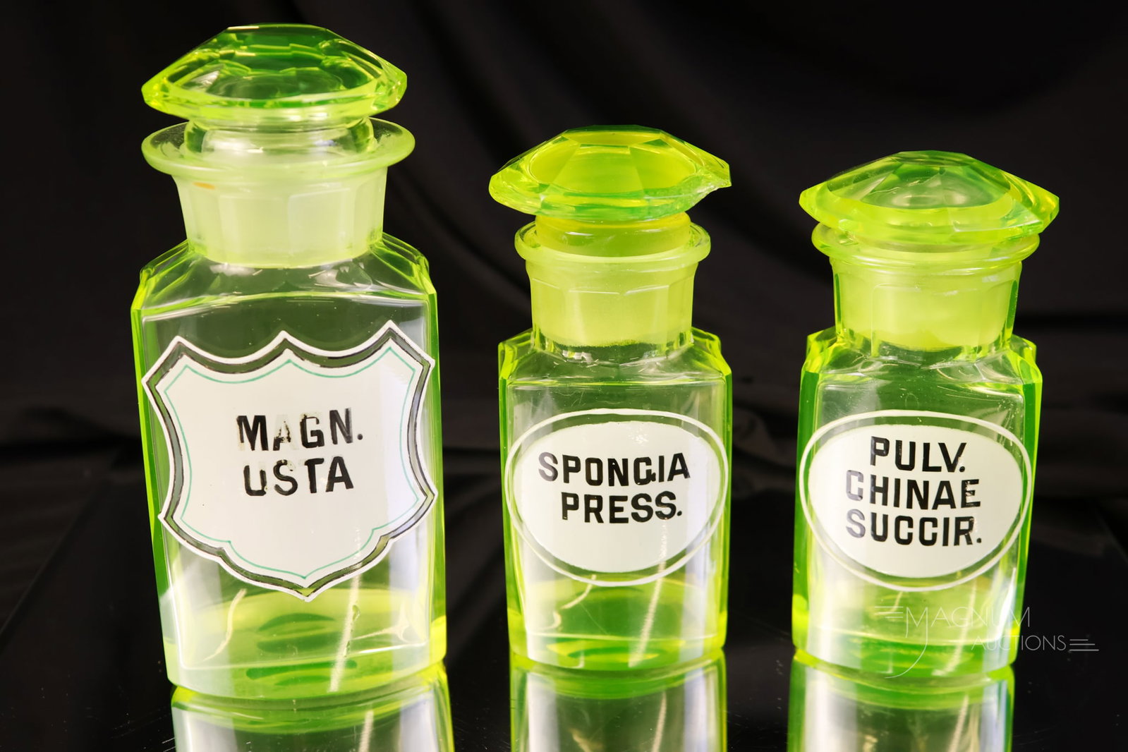 3 pc Lot Antique Vaseline Uranium Enamelled Glass Apothecary Bottles: Three gorgeous and rare finds in antique apothecary bottles. Each is in uranium-rich vaseline glass. Each bottle has an enamelled label of the chemical it once held. The tallest measures 6".