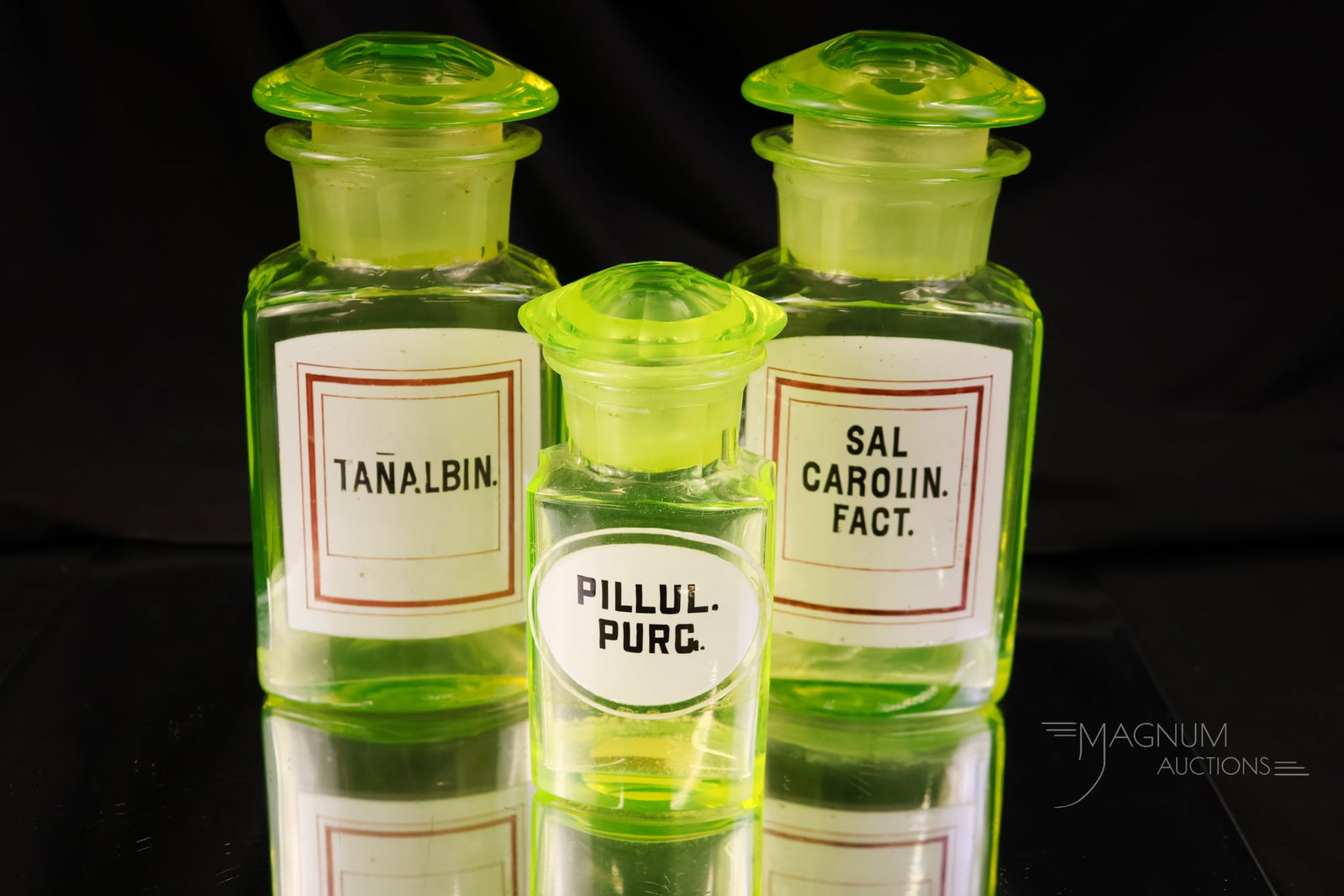 3 pc Lot Vaseline Uranium Antique Enamelled Glass Apothecary Bottles: Three unique finds in antique vaseline uranium-rich apothecary bottles. Each of these has an enamelled label of the chemical it once held. The tallest measures 6 1/4".