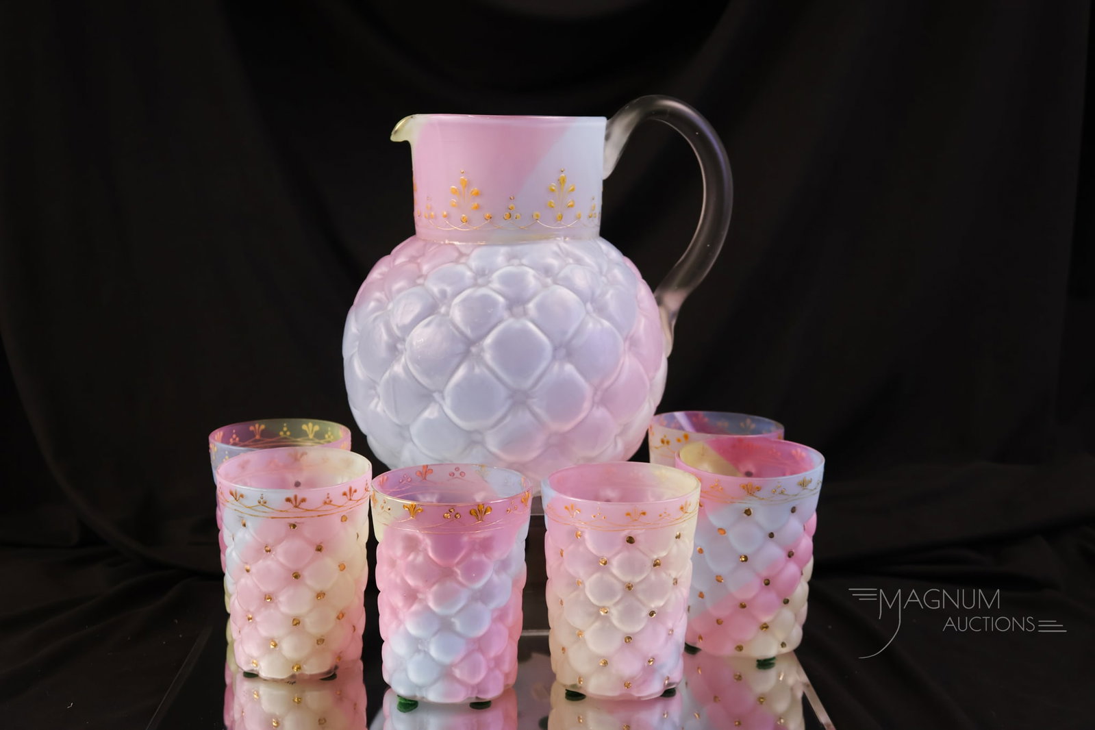 Very Rare Rainbow Gilt Decorated Victorian Glass 7 pc Water Set: A very rare offering in Victorian rainbow glass. This is a seven-piece set of rainbow quilted glass. The set is further enhanced by gilt decoration. The tallest of the offering measures 8 1/4".