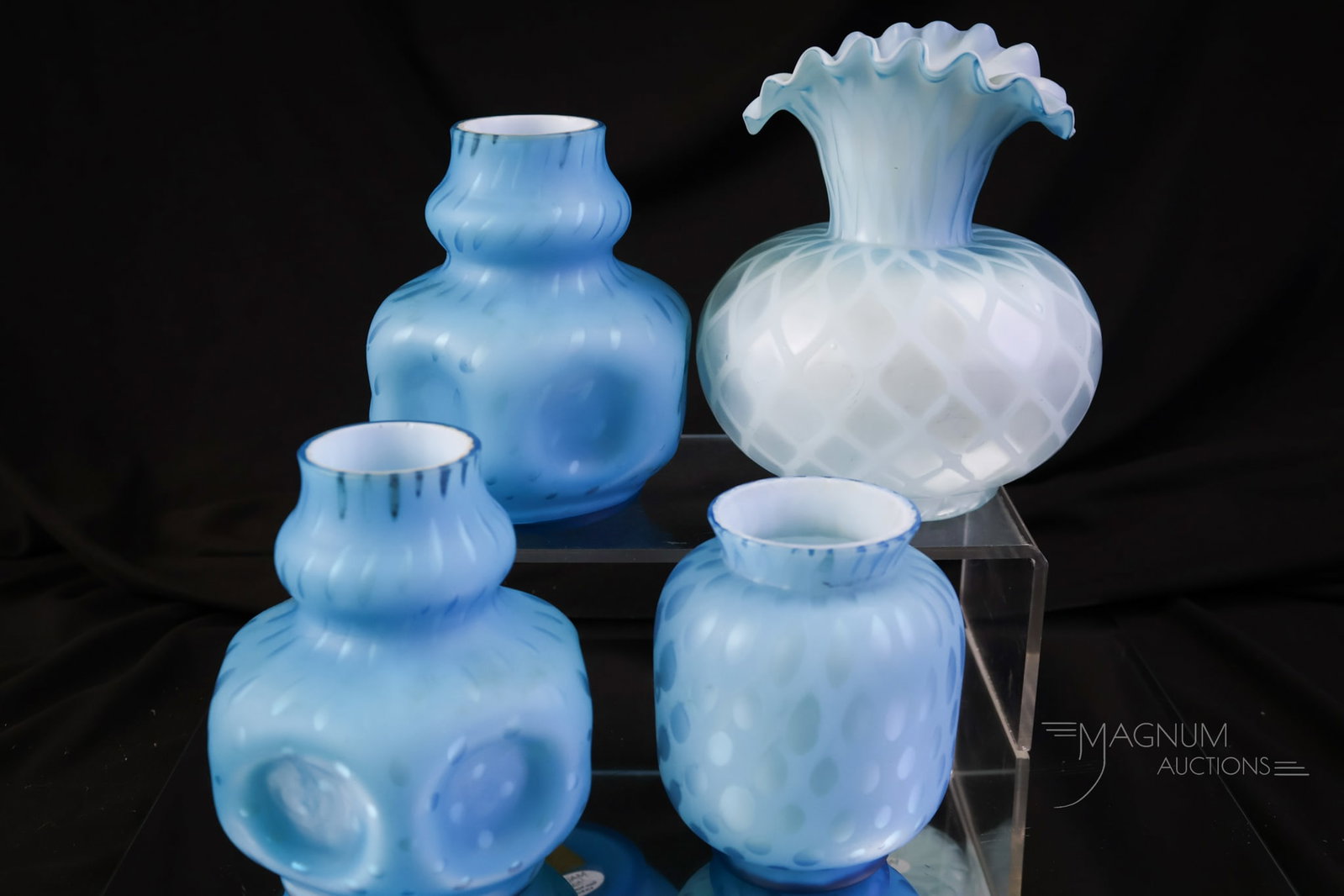 4 pc Lot Victorian Mother of Pearl Satin Glass: Four fine examples of Victorian mother-of-pearl satin glass. There are two in the raindrop pattern and two that are diamond quilted. All are found in a brilliant blue color. The tallest of the lot mea
