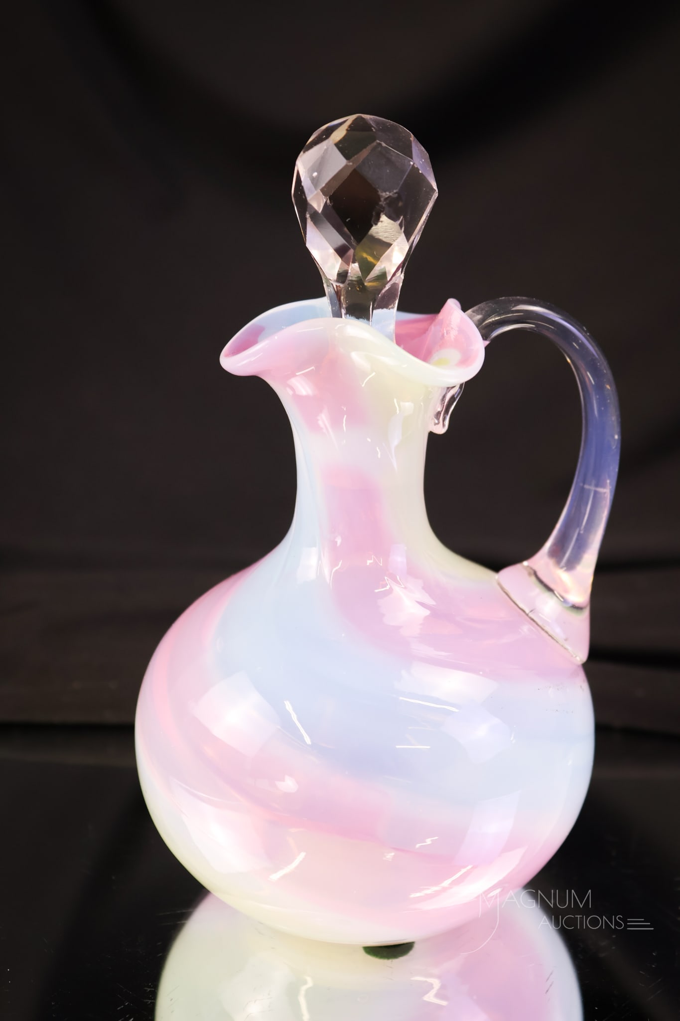 Rare Victorian Phoenix Rainbow Swirl Glass Cruet: A rare find in rainbow glass attributed to Phoenix. This is a cruet in rainbow swirl. The shape is characteristic of Phoenix. This piece is a rare find for any art glass collection. The cruet measures