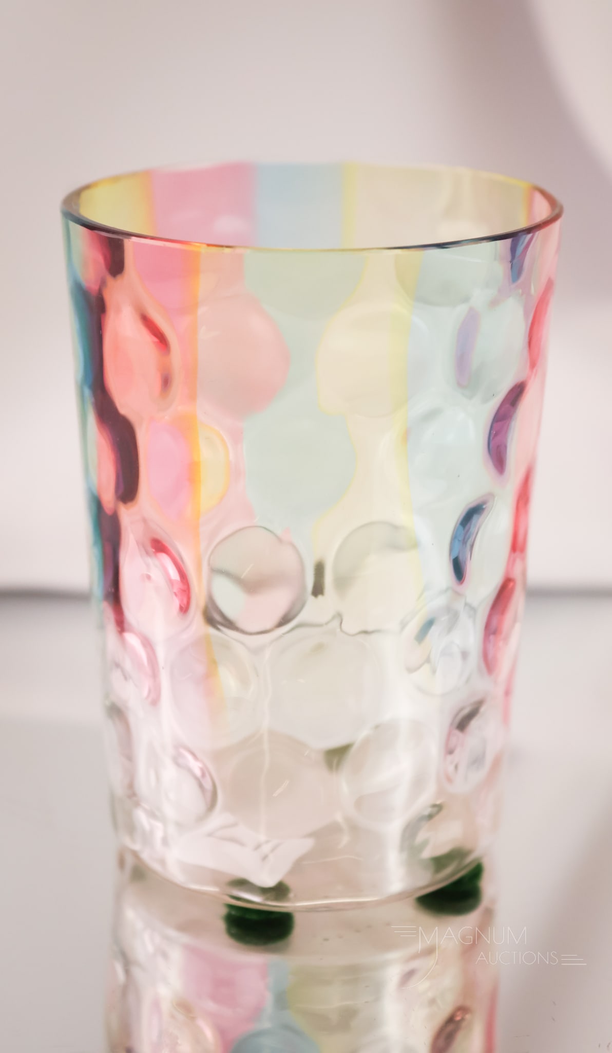 Scarce Rainbow Inverted Thumprint Victorian Glass Tumbler: A scarce find in Victorian glass. This is a rainbow transparent inverted thumbprint tumbler. A lovely color is found on this one. Not many of these around, we dare say! The tumbler measures 3 3/4" tal