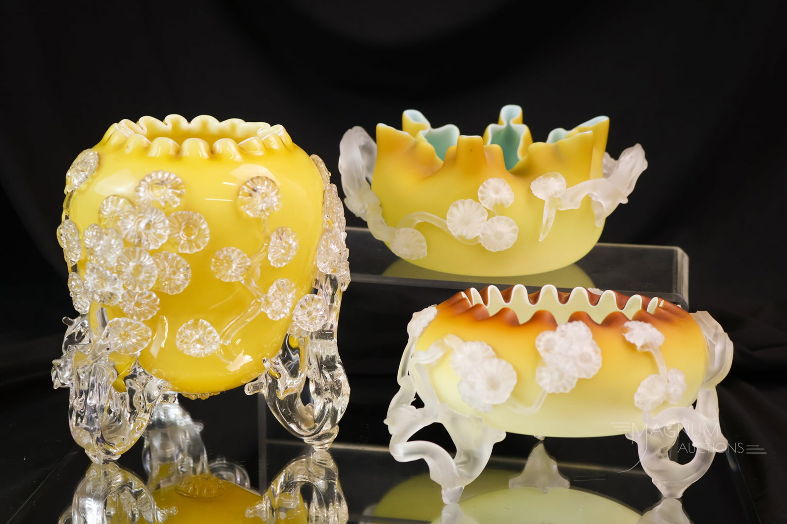 3 pc Lot Stevens & Williams Mat-Su-Noke Art Glass Rose Bowls: A three-piece lot of Stevens & Williams Mat-Su-Noke decorated Victorian art glass rose bowls. Each has issues. One is a three-footed example in butterscotch. It is missing a flower, has a break in a s