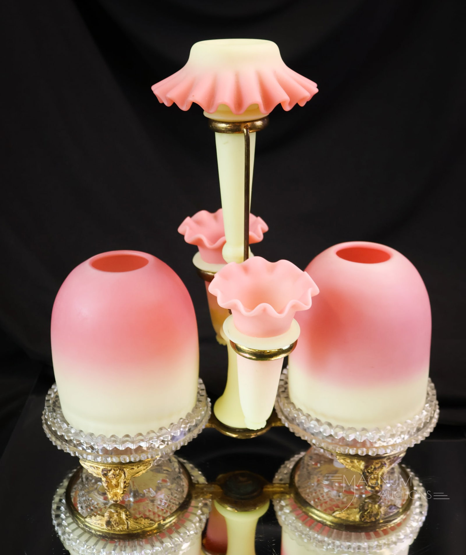 Webb Burmese Victorian Glass Fairy Lamp: A beautiful and rare find in Webb burmese glass. This is an epergne fairy lamp. It has two fairy lamps and three vases. There are also two marked "Clarke's" inserts as well. The piece measures 10"