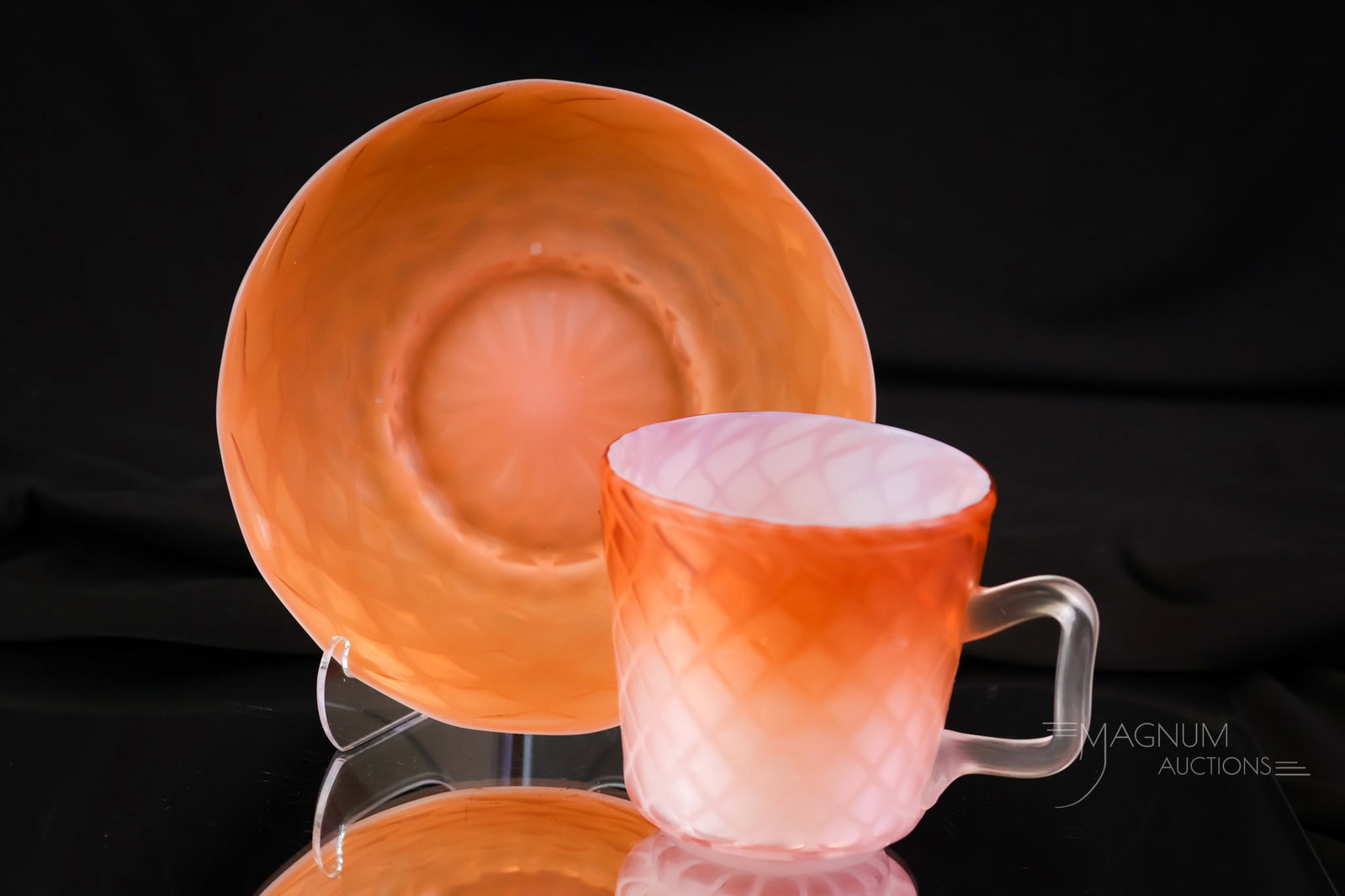 Very Rare Mother of Pearl Satin Victorian Glass Cup & Saucer: Another rare find in Victorian mother-of-pearl satin glass. This is a cup and saucer in vibrant orange mother-of-pearl satin glass. Go find one of these! The cup measures 3" tall and the saucer is 5" 