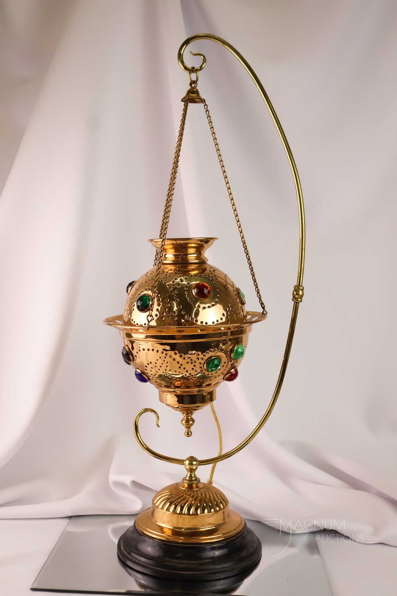 Antique jeweled Brass Victorian Hall Accent lamp: A beautiful antique electric adapted jeweled brass hall lamp turned table accent lamp. This piece features colorful jewels around the body. It has a highly polished brass stand. The lamp has been rewi