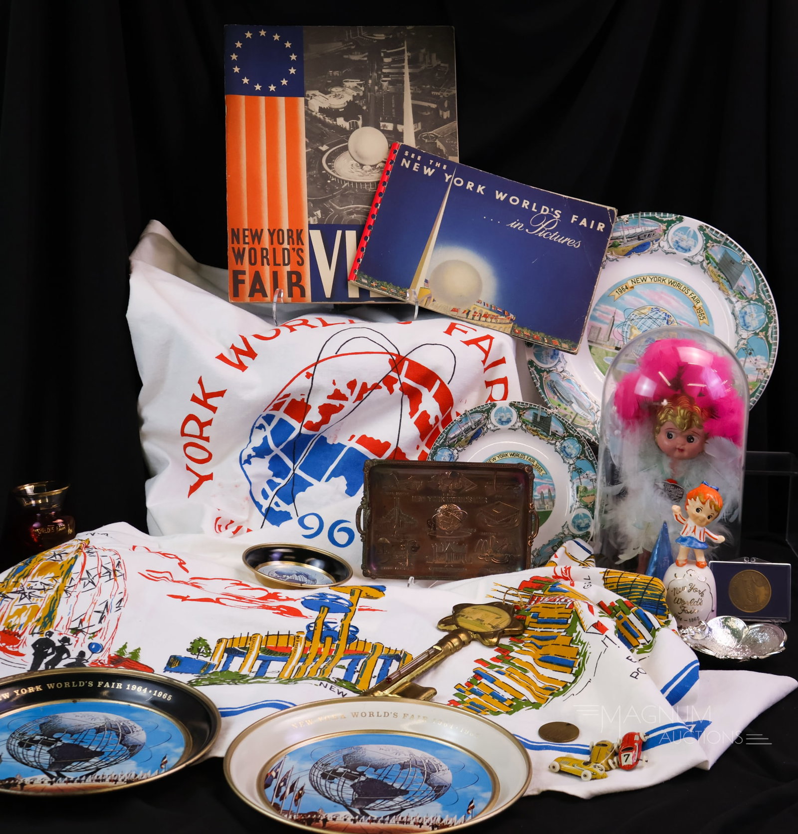 16 pc Lot New York World's Fair Antique Vintage Collectibles: A generous offering of sixteen pieces of New York World's Fair antique and vintage collectibles. The lot includes various articles that are sought after by collectors. There is one non-New York item