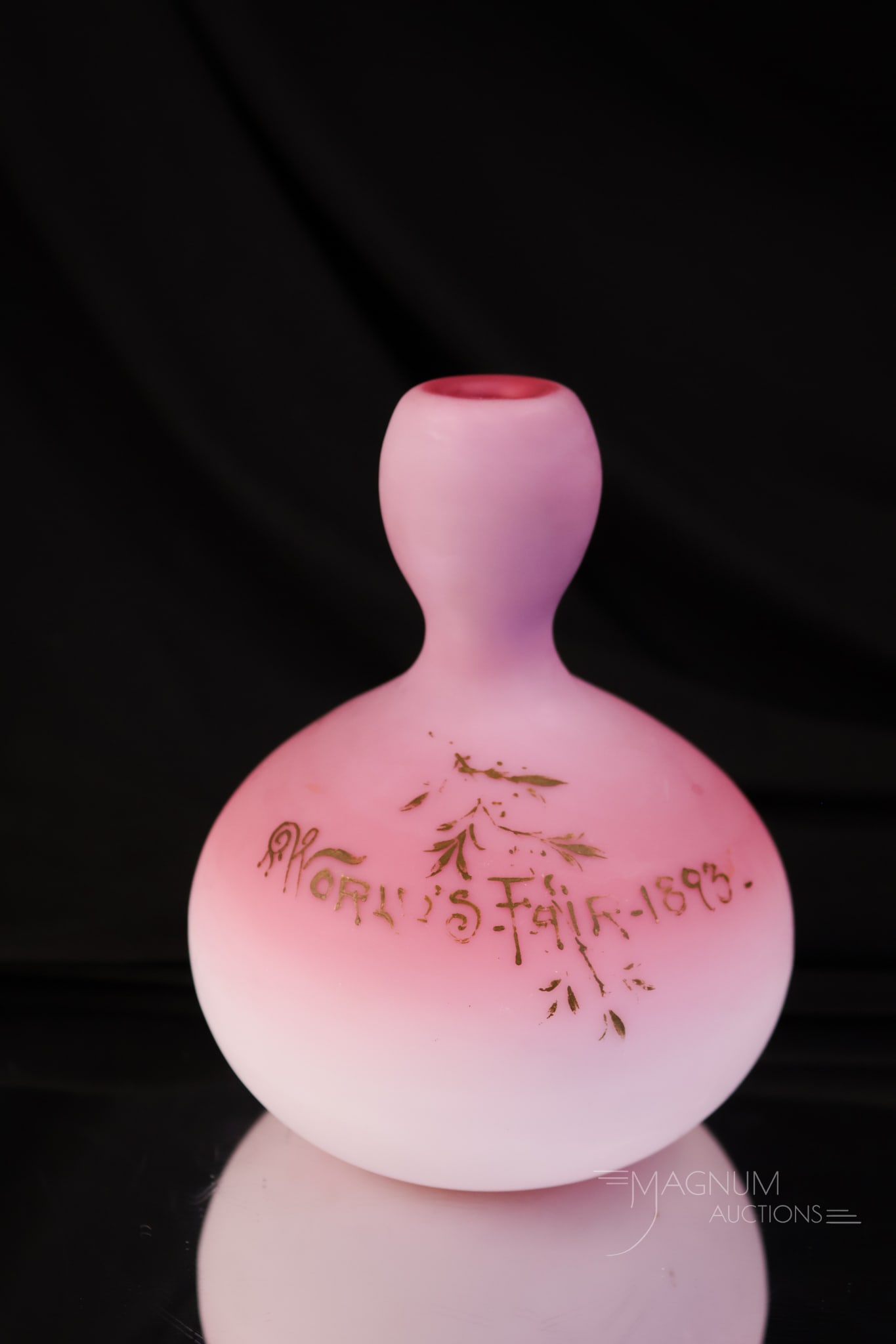 New England Peachblow Victorian Glass 1893 World's Fair Souvenir Vase: A beautiful shaded New England Glass Peachblow vase. This fine example is decorated with "World's Fair 1893" in gold. Not many pieces like this around. This lot reminds Etta, our 95-year-old spry cust