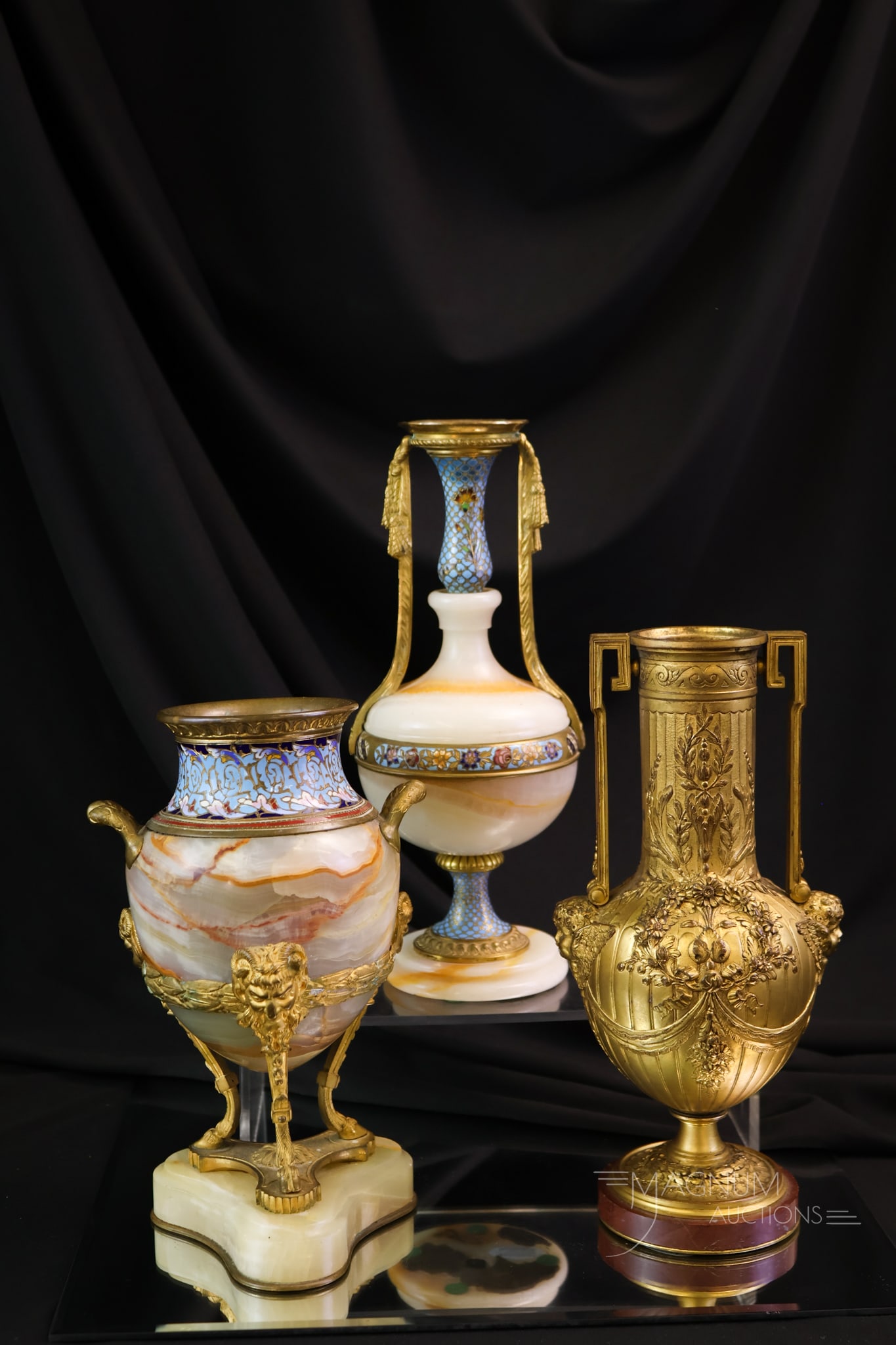 3 pc Lot Gilt Bronze & Stone Champleve Vases: Three lovely decorative vases in this offering. These are gilt bronze and stone. The first two are stone and gilt bronze with Champleve. The third is a gilt bronze with a red agate base. The tallest m