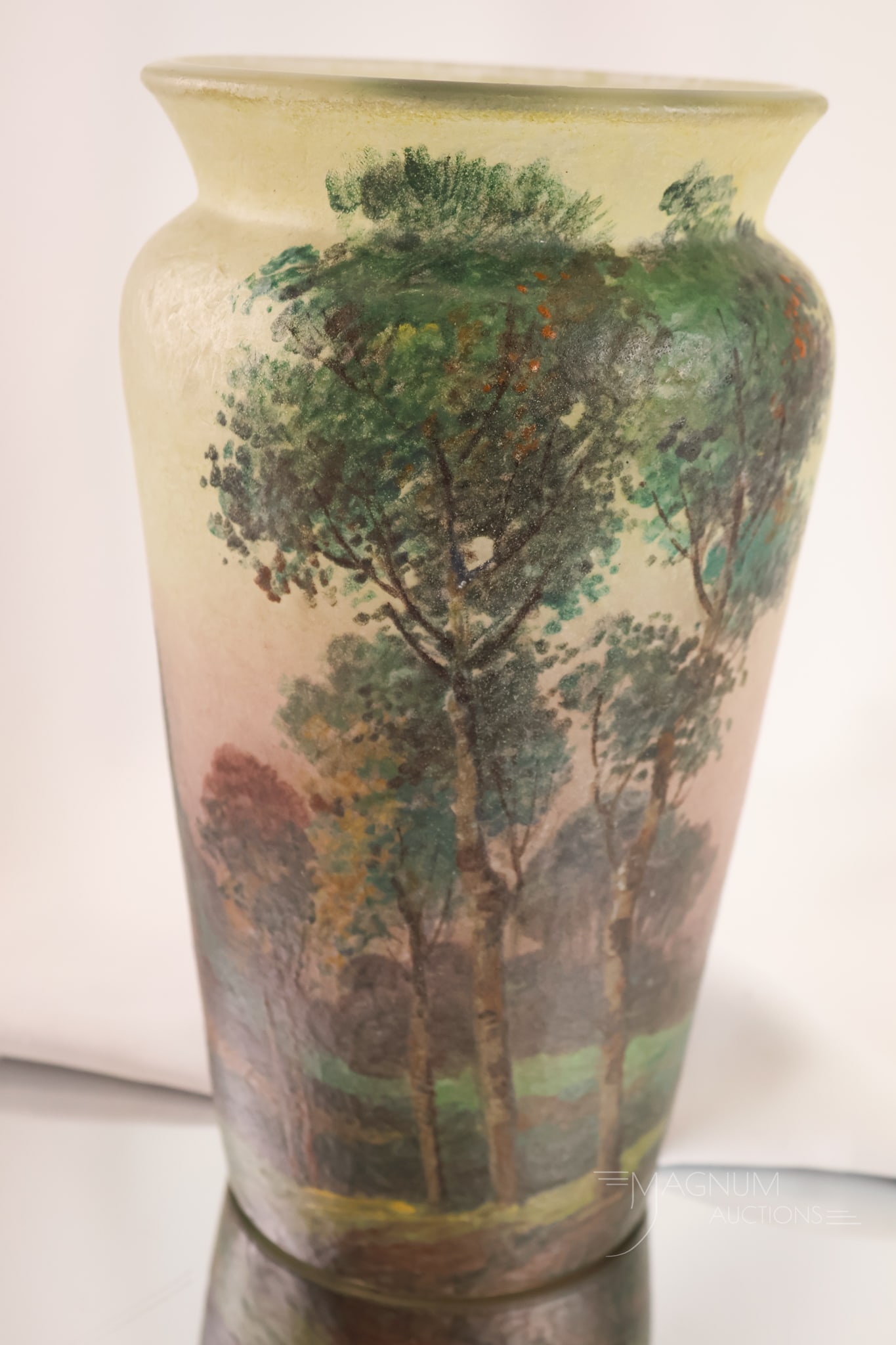 Signed Handel Teroma Chipped Ice Woodland Scene Art Glass Vase: A signed Handel Teroma Chipped Ice glass Vase. This piece features a woodland scene. The vase measures 9 1/2" tall and 5 1/2" wide.