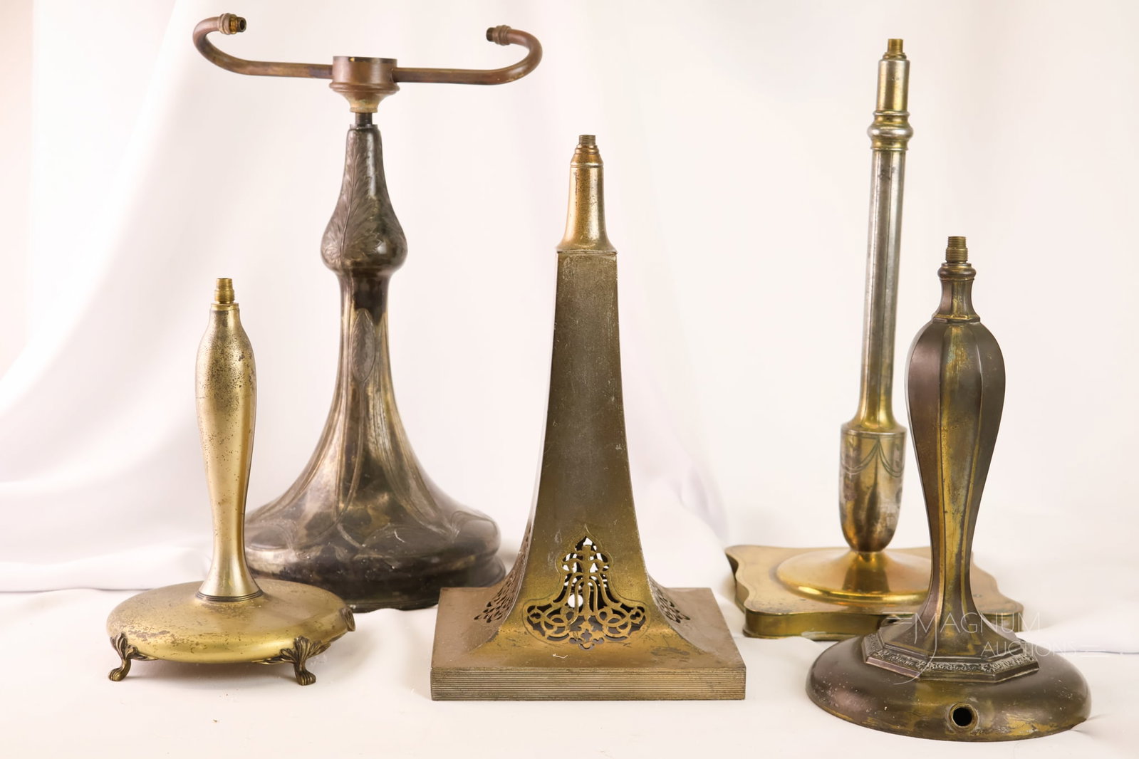 5 pc Lot Antique Pairpoint Puffy Reverse Painted Lamp Bases: An assorted lot of five antique Pairpoint reverse-painted puffy lamp bases. The tallest measures 15".