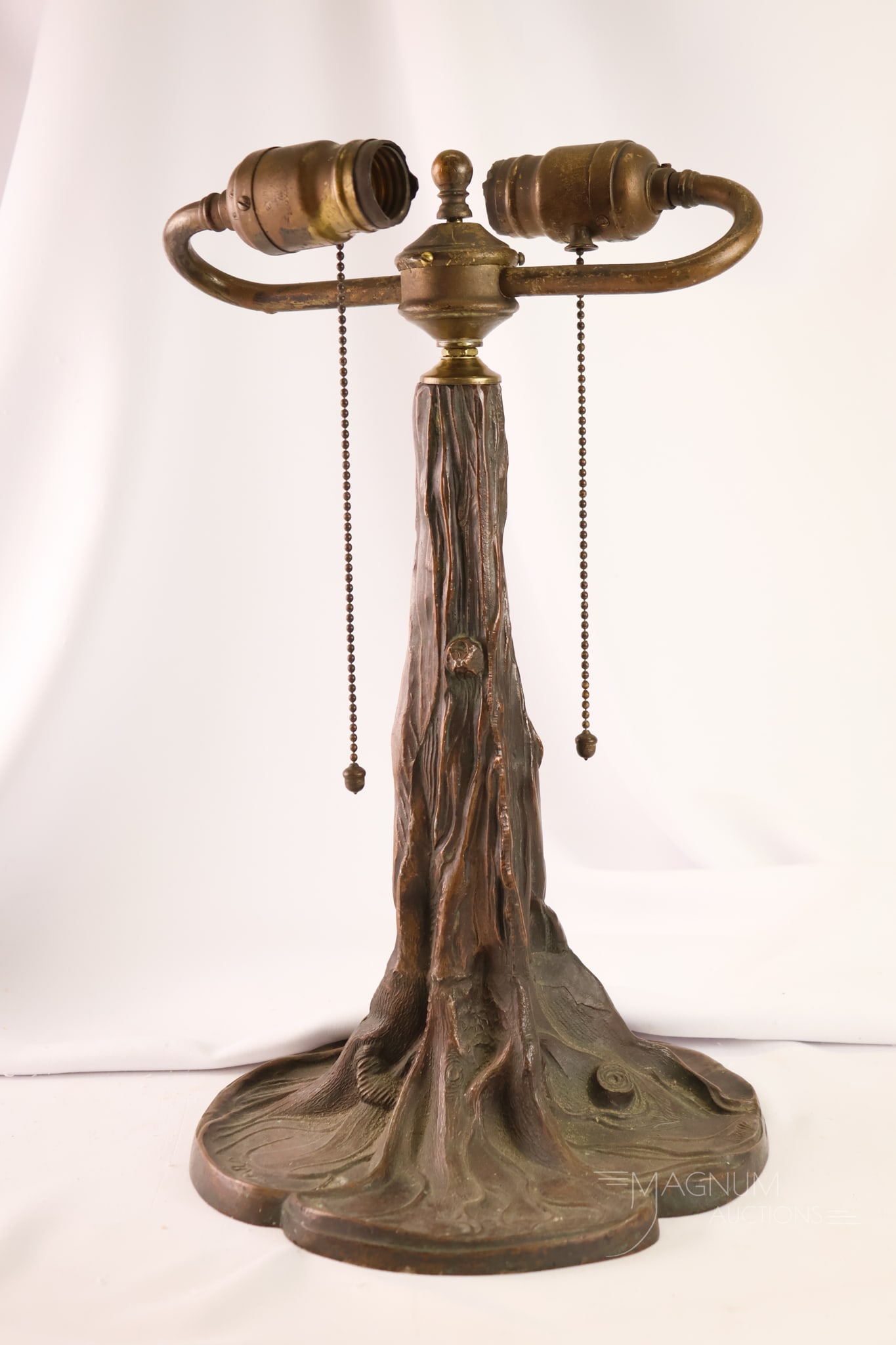Antique Pairpoint Figural Tree Trunk Lamp Base: A beautiful antique signed Pairpoint reverse-painted figural tree trunk lamp base. This base features the original dark patina. The lamp measures 15 1/2" tall to the top of the finial. And 8 1/2"