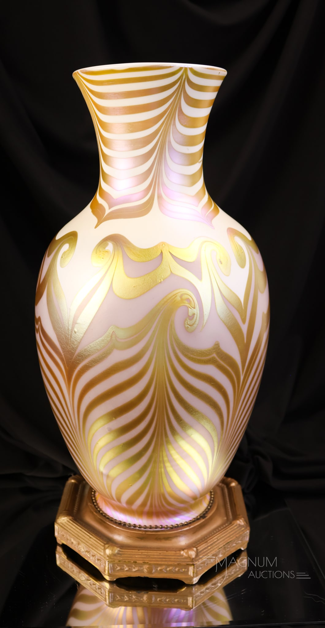Quezal 15" Art Glass Lavender Hooked Feather Iridescent Table Lamp Base: A beautiful piece of Quezal art glass. This is a lamp base with a rare lavender Quezal iridescent hooked feather glass portion. It is large in size. The piece measures 15 1/4" tall. And 6 1/2" wide.