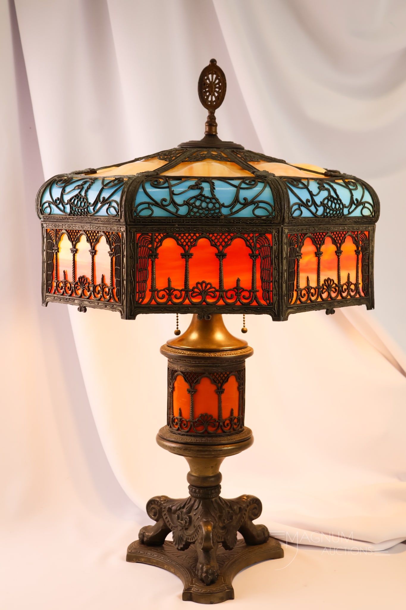 Antique Empire Slag Glass Bent Panel Filigree Table Lamp: A striking lamp that you'll want to own. This lamp features wonderful coloring and form. This is an Empire bent panel slag glass table lamp with filigree overlay. This piece has three colors of slag
