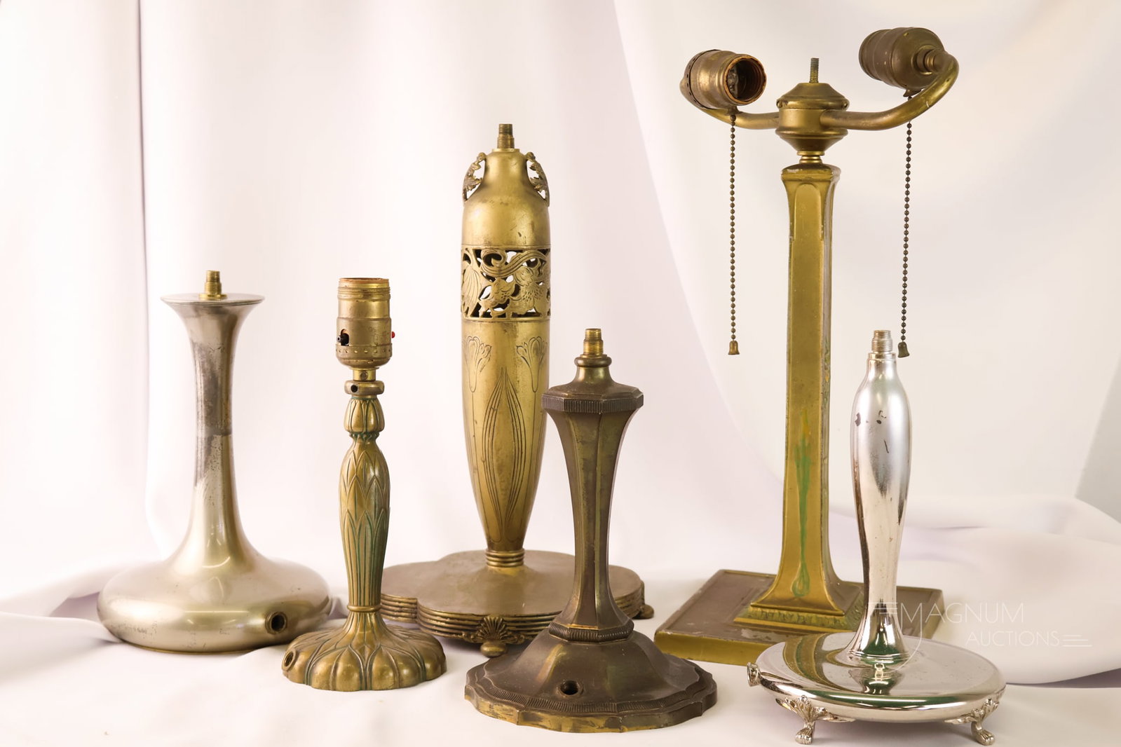 6 pc Lot Pairpoint Reverse Painted Puffy Lamp Bases: A six-piece lot of antique Pairpoint reverse-painted lamp bases. The tallest measures 16".