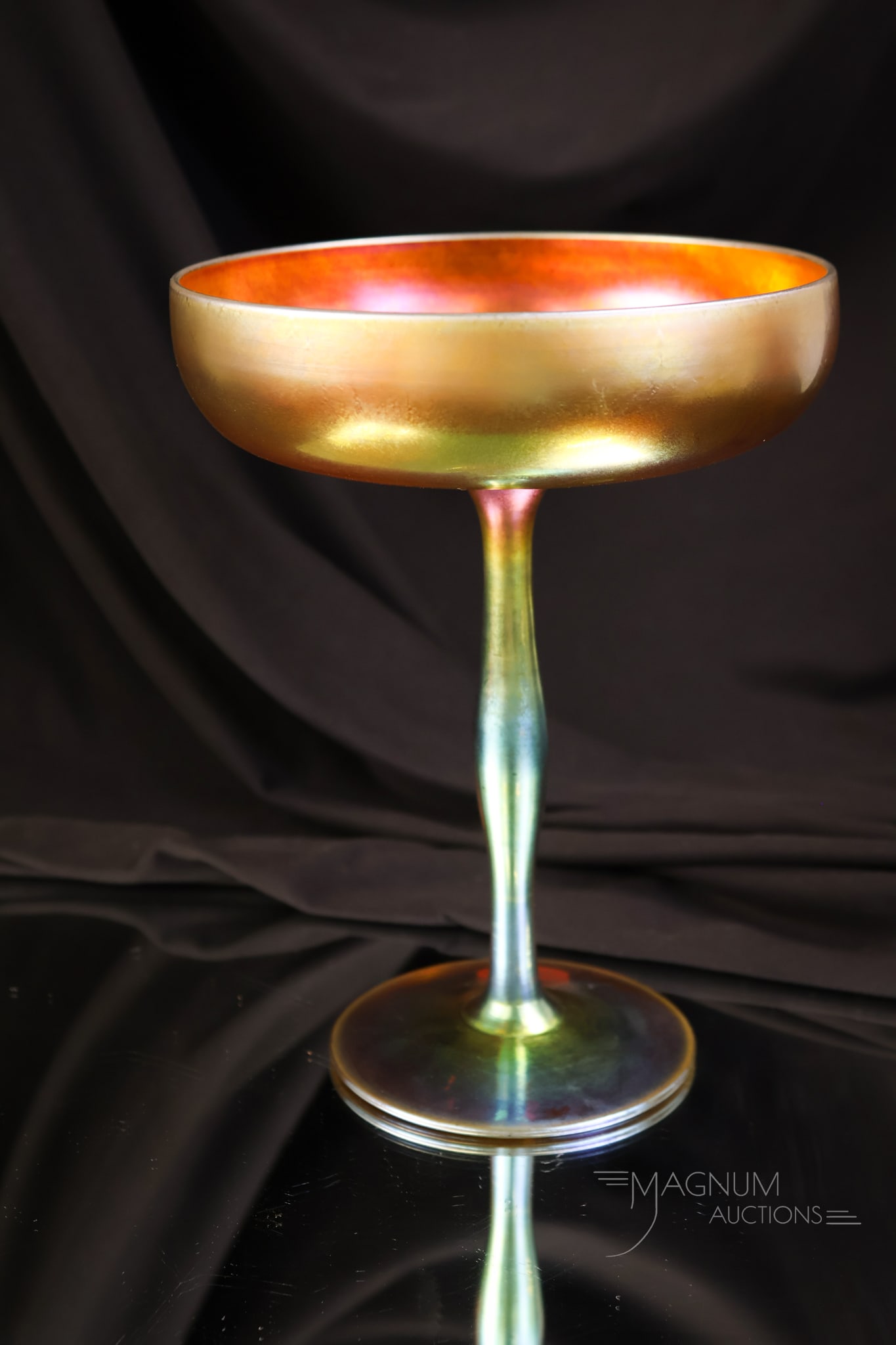 Steuben Gold Aurene Pedestal Art Glass Compote: A brilliant Steuben gold aurene art glass pedestal compote. This piece is marked "Steuben Aurene 2642." It measures 8" tall and 6" wide.