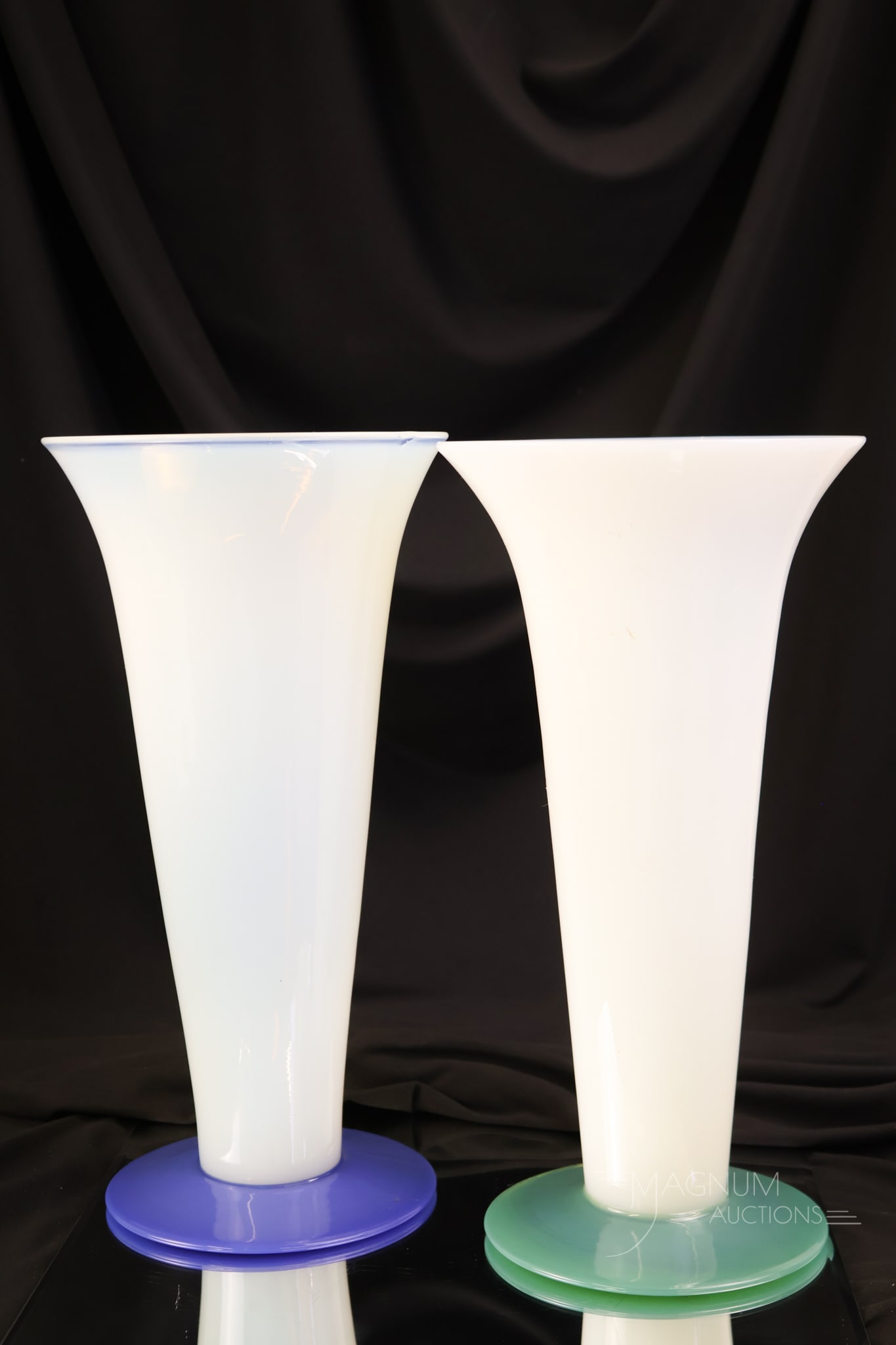2 pc Lot Fry Foval Opalescent Flared Vases Green & Blue: Two fine examples of flared Fry Foval opalescent vases with blue and green bases. Each measures 12" tall and 6" wide.