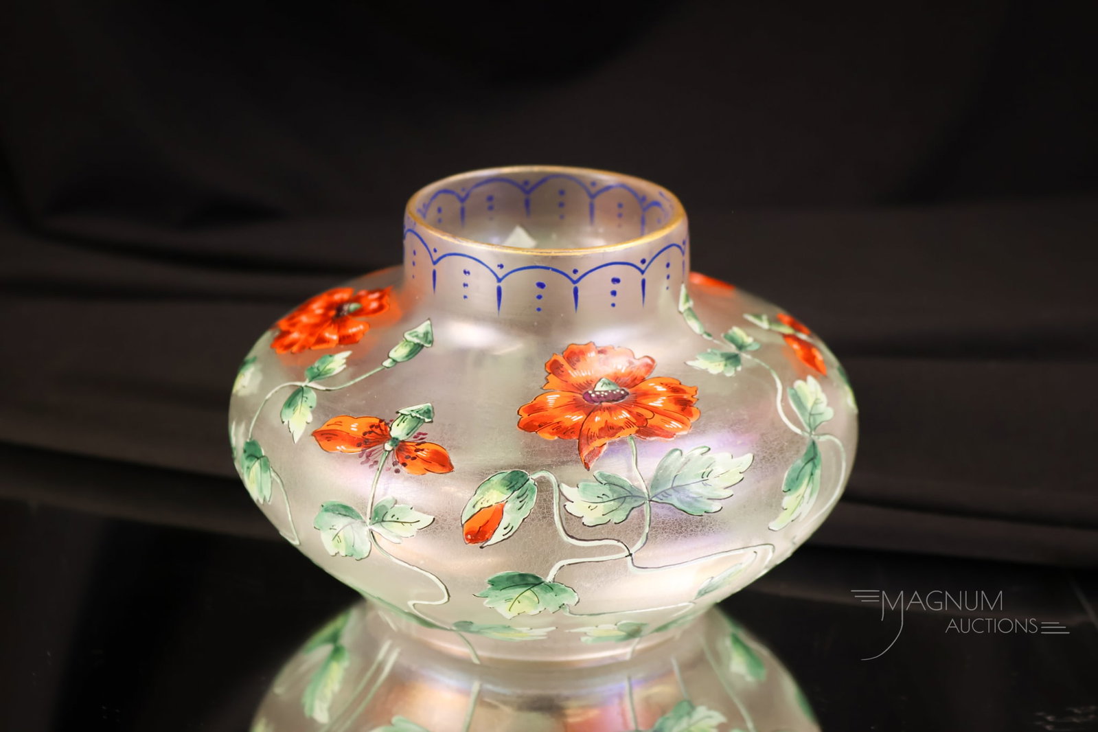 Signed Fritz Heckert Iridized Enamel Decorated Poppy Vase: A wonderful find in a piece of signed Fritz Heckert Art Nouveau vase. This vase is decorated with tomato red/orange poppies and a stylized foliage design. The vase measures 3 1/2" tall and 5 1/4" wide