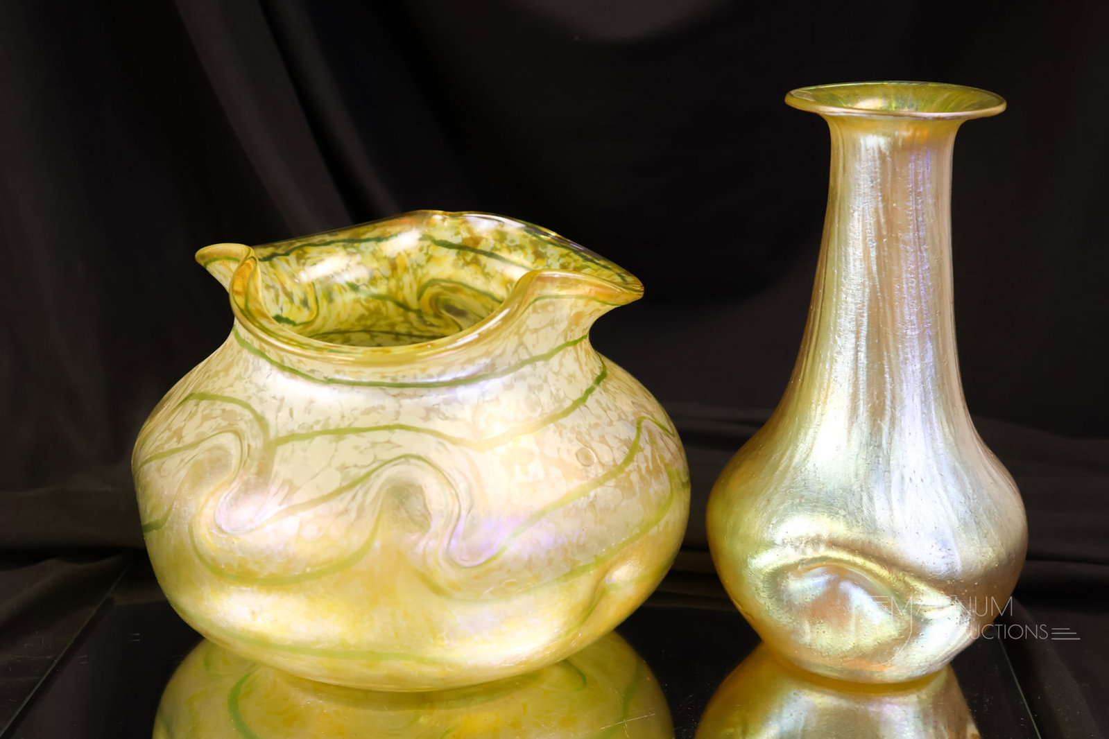 2 pc Lot Austrian Art Nouveau Glass Gems: This lot offers two delightful finds in Austrian art glass. The first is a Fritz Heckert "Changeant" gold iridescent vase that's rich in uranium content. The second is a Loetz gold Rusticana vase. The