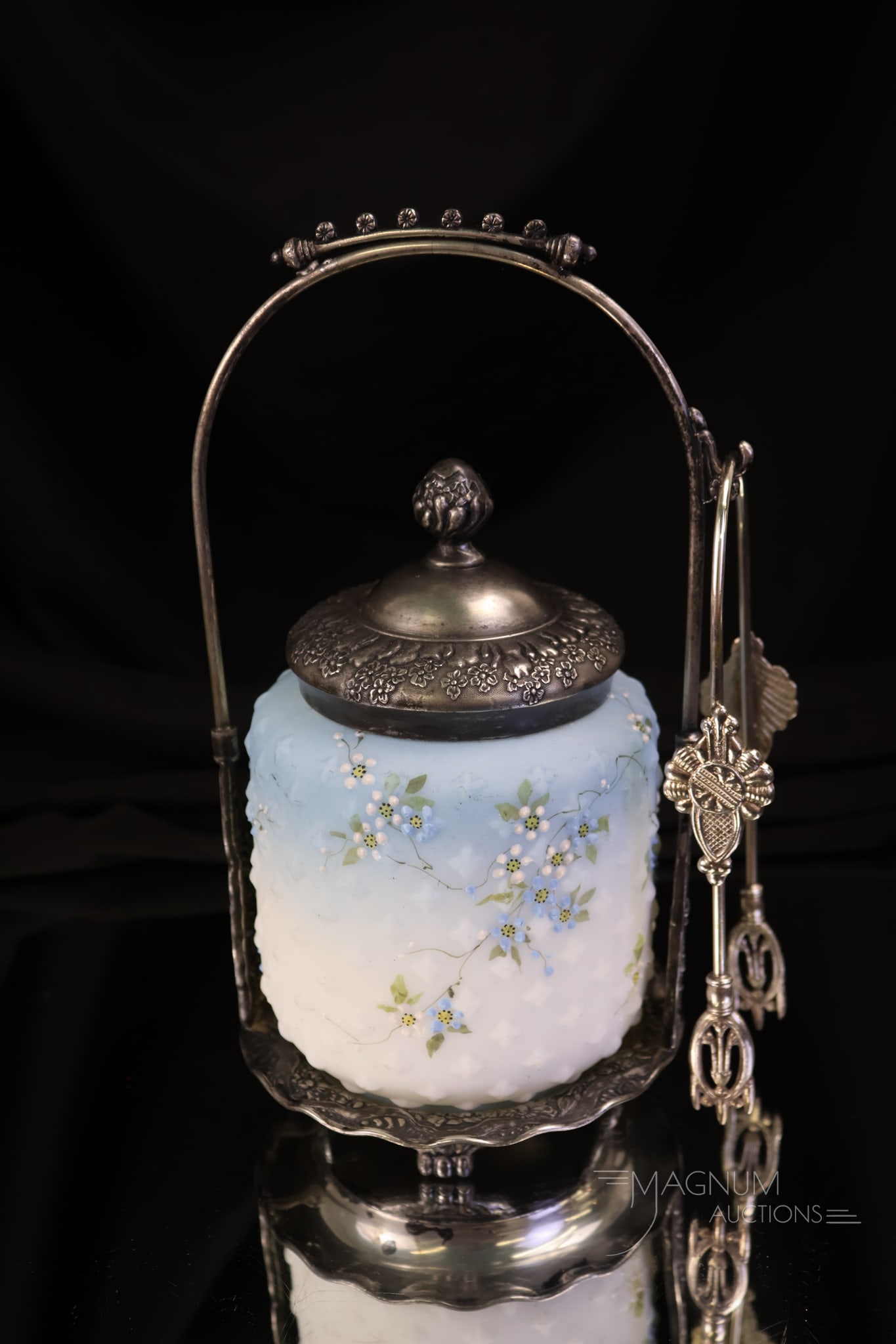 Pairpoint Mt. Washington Crown Milano Glass Victorian Pickle Castor: A beautiful Mt. Washington Crown Milano glass and Pairpoint Silverplate Victorian pickle castor. This castor has a heavenly blue-shaded jar with blue and white enamelled florals around the body. The p