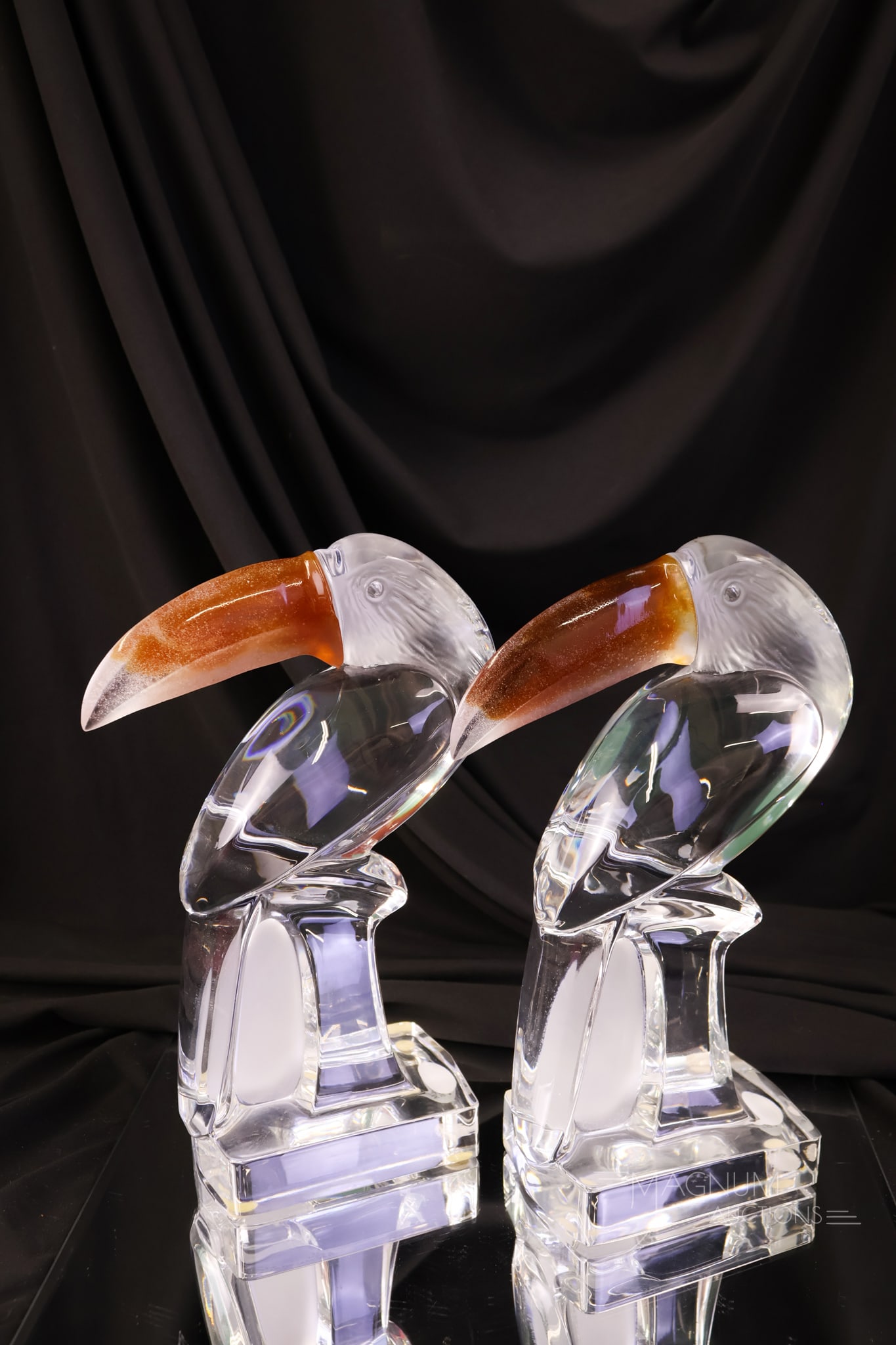 Pair Signed Daum pate De Verre Toucan Sculptures: Pair Signed Daum pate De Verre Toucan sculptures. Each features a colorful beak. Each measures 9 1/2 " tall and 5 3/4" wide.