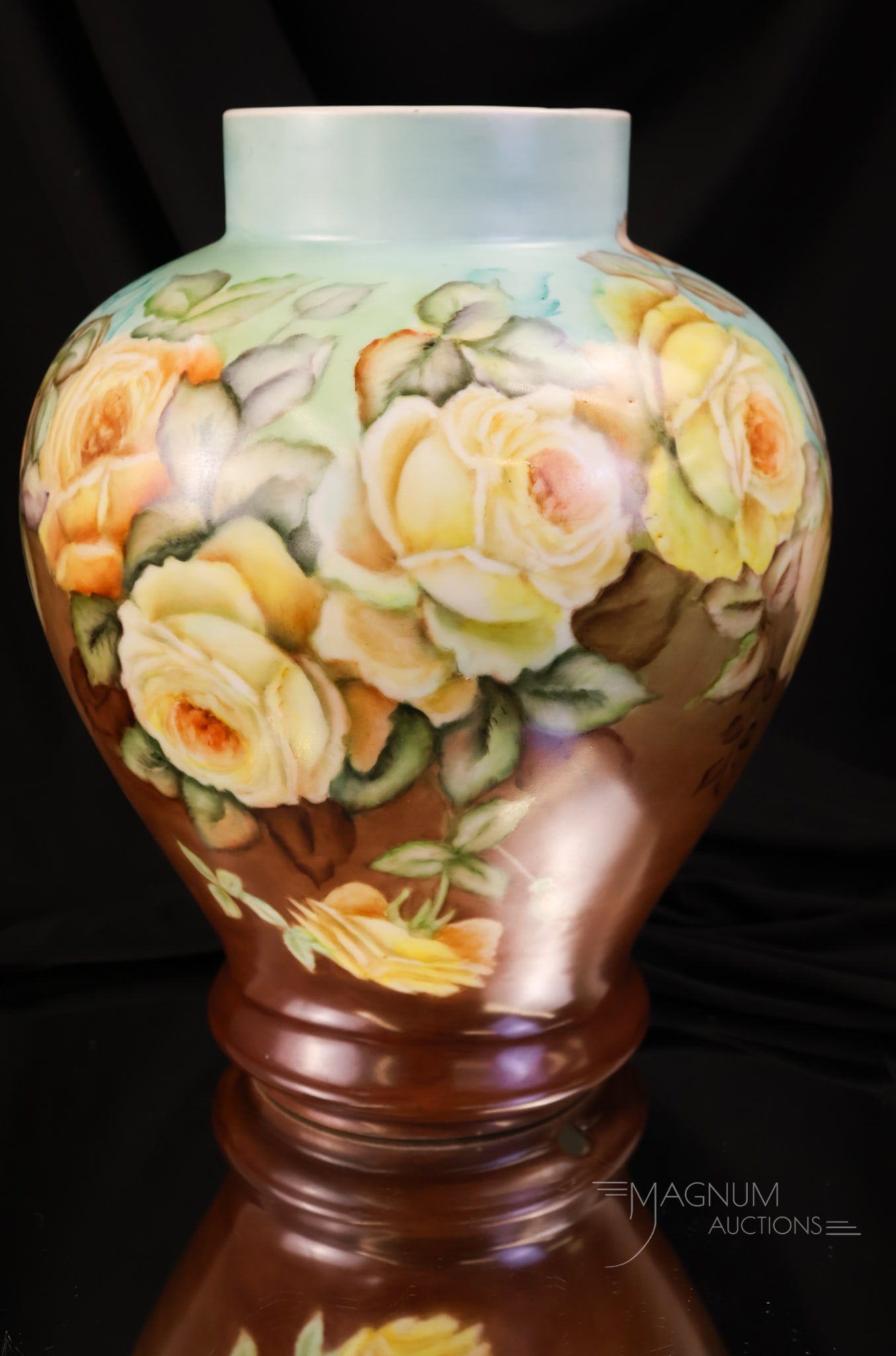 German Porcelain Yellow Roses Hand Painted Porcelain Vase Base: A fine signed Schumann German porcelain vase base. This piece is lavishly decorated with yellow roses. The piece measures 12" tall and 9" wide. This also has a factory hole for a lamp base.