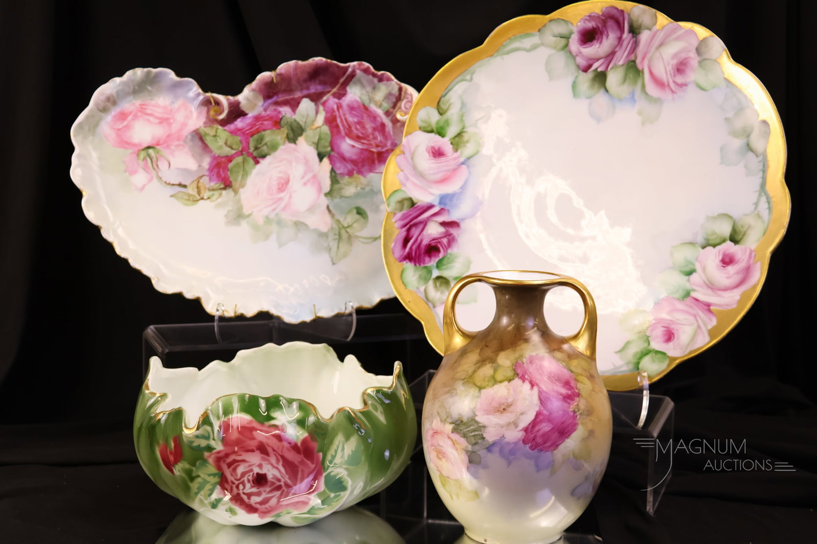 4 pc Lot Hand Pianted Porcelain Royal Rudolstadt Limoges: Four desirable finds in hand-painted porcelain. This lot includes a marked K & Co. bowl. A Royal Rudolstadt handled vase. There is a W. G. & Co. tray. Lastly, there is a Limoges charger with a gold ri