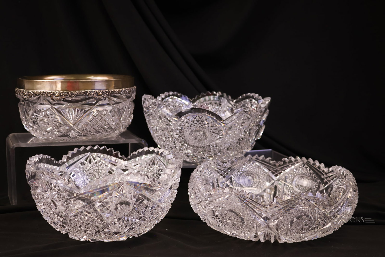 4 pc Lot American Brilliant Cut Glass Bowl & Sterling: Four nice selections for your bidding pleasure. This lot offers four American Brilliant cut glass bowls. One has a sterling silver rim. The tallest measures 4".