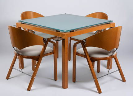 JAIME TRESSERRA CLAPÉS (Barcelona,: JAIME TRESSERRA CLAPÉS (Barcelona, 1943)."Corner" game table and four "Spinnacker" chairs.Walnut wood table, shiny nickel hardware and 19 mm acid etched glass top. Walnut wood chairs, velvet upholste