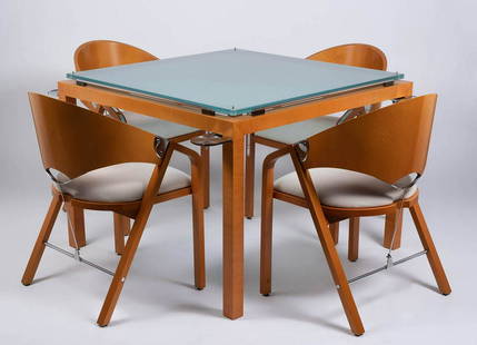 JAIME TRESSERRA CLAPÉS (Barcelona, 1943). "Corner": JAIME TRESSERRA CLAPÉS (Barcelona, 1943)."Corner" game table and four "Spinnacker" chairs.Walnut wood table, shiny nickel hardware and 19 mm acid etched glass top. Walnut wood chairs, velvet uphol