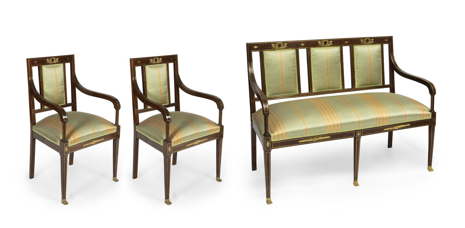 Empire style seating, late 19th century. Madeira of: Empire style seating, late 19th century.Madeira of mahogany, brass and gilt bronze.Measurements: 92 x 123 x 49 cm (sofa); 93 x 45 x 56 cm (seats) x 2.Set of three-seater sofa and two Empire style armc