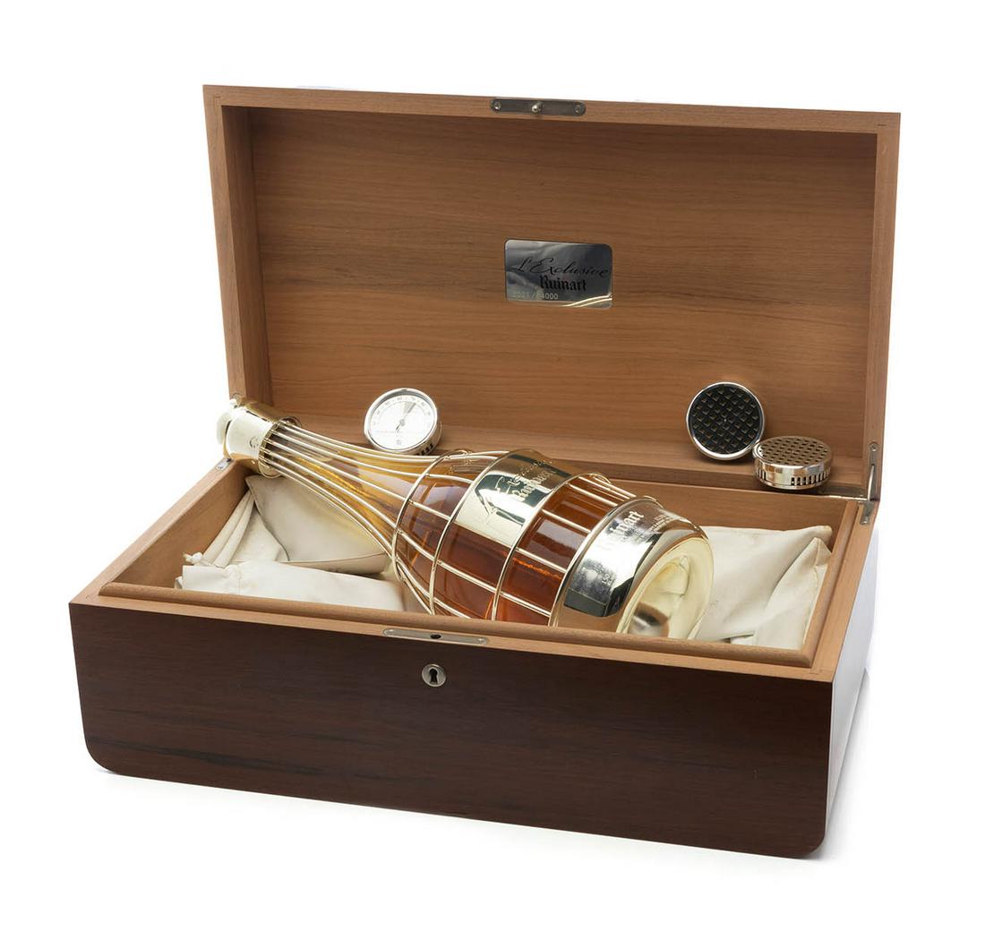 Ruinart LÂ´exclusive Magnum bottle, Blanc de Blancs.: Ruinart LÂ´exclusive Magnum bottle, Blanc de Blancs. Category: champagne brut. A.O.C Champagne. Limited edition and numbered 2021/14000, in a wooden box with accessories. 1.5 L.This cuvÃ©e was pro