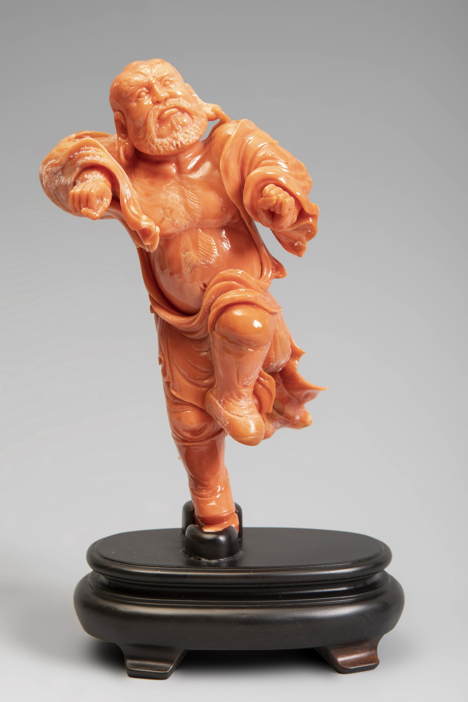 Fighter. China, 20th century.  Coral.  Base carved in (1 of 3)