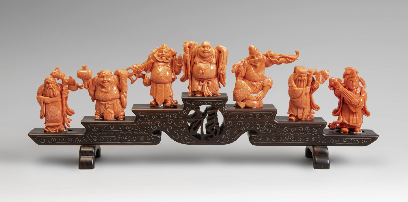 The seven wise men. China, 20th century.  Coral.  Base (1 of 5)