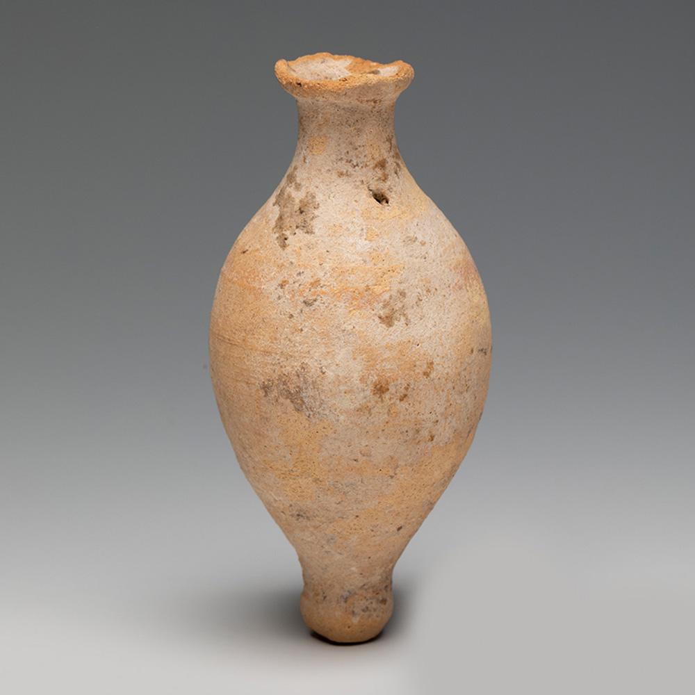 Roman ointment. I-III Century A.D. Terracotta.: Roman ointment. I-III Century A.D.Terracotta.Measurements: 9,5 x 4,5 cm .Terracotta vessel with globular body and neck. This type of flasks were used to contain ointments, perfumed oils, etc., liquids