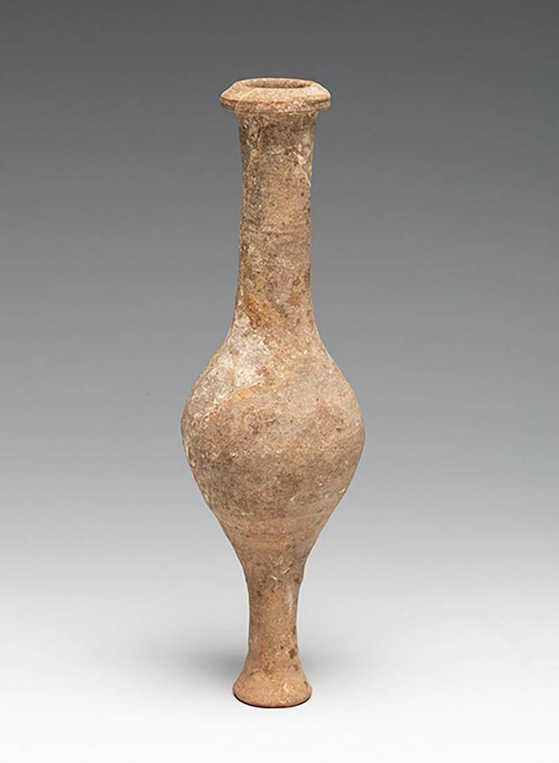 Roman ointment. I-III Century A.D. Terracotta.: Roman ointment. I-III Century A.D.Terracotta.Measurements: 19 x 6 cm .Terracotta vessel with globular body and neck. This type of flasks were used to contain ointments, perfumed oils, etc., liquids in