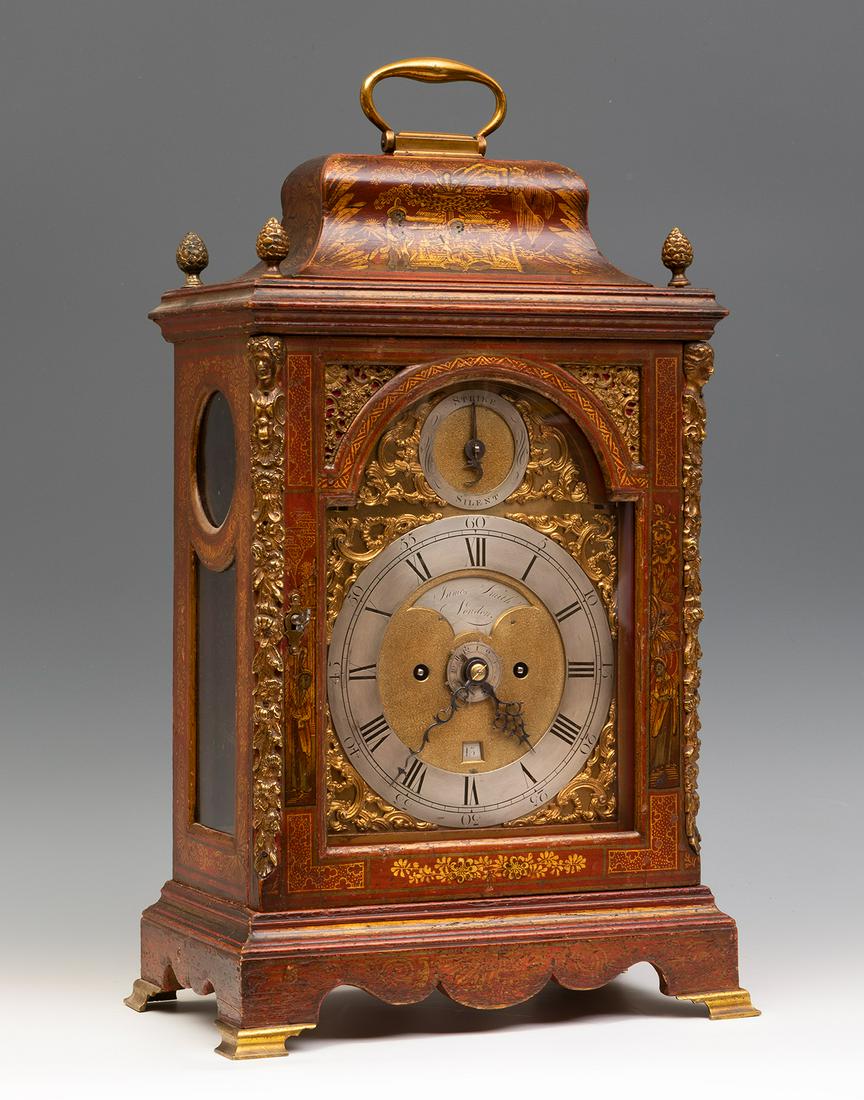 George II bracket clock, signed JAMES SMITH. London, mid 18th century. Red lacquered case with gilt: George II bracket clock, signed JAMES SMITH. London, mid 18th century. Red lacquered case with gilt bronze appliques. Gilt dial with gilt bronze spandrels and chime override. Eight days winding machin