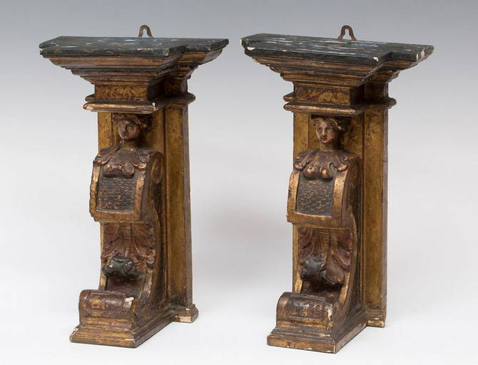 Pair of corbels; Spanish school; century XVI. Carved and polychrome