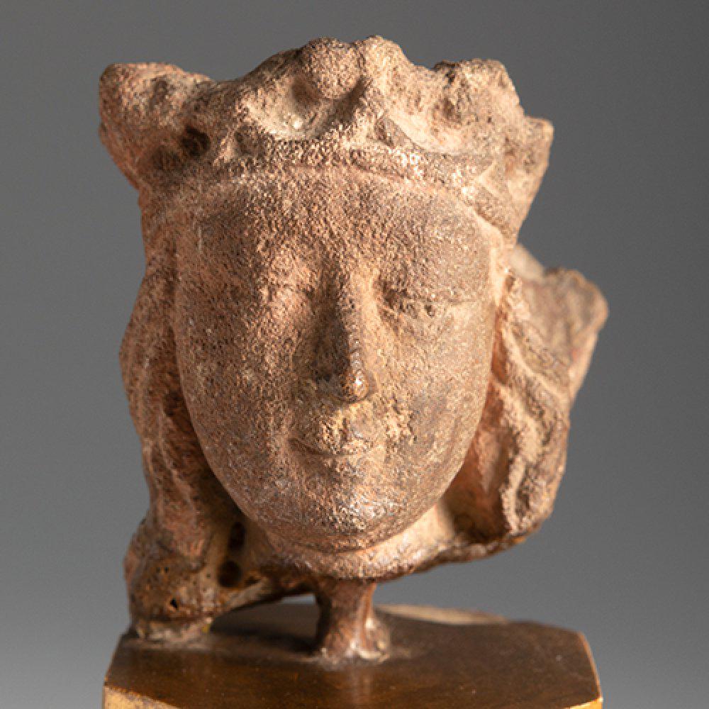 Gothic head. Spain, 14th century. "Crowned Virgin". Stone . Gilded wooden pedestal. The base lacks (1 of 3)