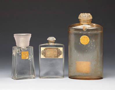 COTY fragrances. France, between 1920-1930.: COTY fragrances. France, between 1920-1930.Three bottles of perfume and cologne " Muse, Jasmin de Corse and L'Origan".Molded glass.Coty marks on the base of two of them.Provenance: Spanish private