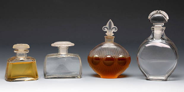 Four Art Deco perfume bottles. France ca. 1940. Moulded glass. Provenance: Spanish private: Four Art Deco perfume bottles. France ca. 1940. Moulded glass. Provenance: Spanish private collection, formed between 1970 and 1995. Measurements: 13 x 7,5 x 3,5 cm (largest).