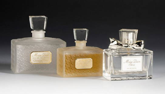 "Miss Dior", three fragrances by CHRISTIAN DIOR. France, late 20th century, early 21st century.: "Miss Dior", three fragrances by CHRISTIAN DIOR. France, late 20th century, early 21st century. Moulded glass bottles. Plastic and metal stopper. Provenance: Spanish private collection, formed