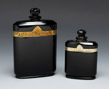 FÃ‰LICIE WAMPOUILLE for CARON. Two bottles of "Nuit de Noel" perfume. France, ca. 1925 the larger: FÃ‰LICIE WAMPOUILLE for CARON. Two bottles of "Nuit de Noel" perfume. France, ca. 1925 the larger one. Ca. 1950 the small one. Baccarat crystal. Marks "Caron made in France" on one of them and