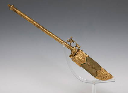 Bhuj Dagger: Kutch-Gujarat, India, 19th century. Steel with silver and gold inlays. It has a green: Bhuj Dagger: Kutch-Gujarat, India, 19th century. Steel inlaid with silver and gold. It has a green velvet sheath. There are cracks in the sheath. Measurements: 60 x 10 x 4 cm; 63 x 10 x 4 x 4 cm