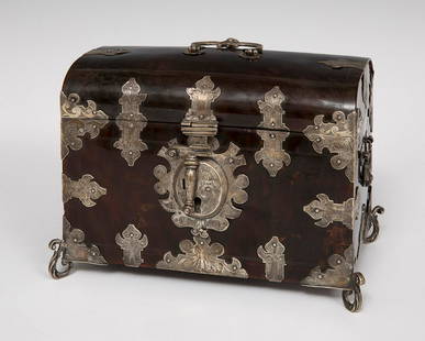 Viceregal casket; Mexico, Viceroyalty of New Spain, circa 1700. Carey and chiselled silver. It has a: Viceregal chest; Mexico, Viceroyalty of New Spain, circa 1700. Tortoiseshell and chiselled silver. CITES certificate attached. Provenance: Private collection Portugal. Measurements: 16 x 21 x 12,5