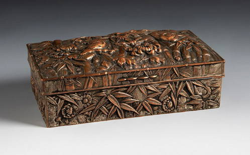 YAMATO-GUMI (active in Japan 1899-1960). Art Deco jewellery box, ca.1940. Manufacture in: YAMATO-GUMI (active in Japan 1899-1960). Art Deco jewellery box, ca.1940. Manufacture in copper-plated metal decorated in relief with bamboo canes and dragons. With "Made in Japan" stamp on the
