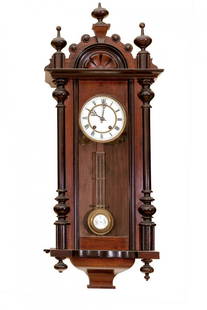 Early 20th century wall clock. Wood.: Early 20th century wall clock. Wood. Measurements: 86 x 32 x 17 cm. Wall clock made of wood. The piece has a rectangular structure with decoration based on scrolls. The body presents the clock in the