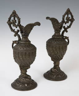 Pair of jugs; Spain or France; late nineteenth century. Calamine.: Pair of jugs; Spain or France; late 19th century. Calamine. Measurements: 37 x 13 x 19 cm (x2). Pair of jugs that present the same design of round base on which a foot is established decorated with